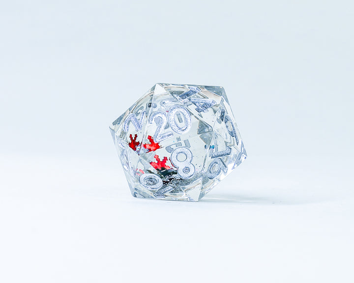 Sirius Dice: Snow Globe: 22mm Sharp Edged D20 - Silver Ink, Silver Glitter, Silver Green and Red Snowflakes